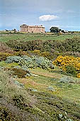 Selinunte the temple hill. Distant view with Temple E in far distance 